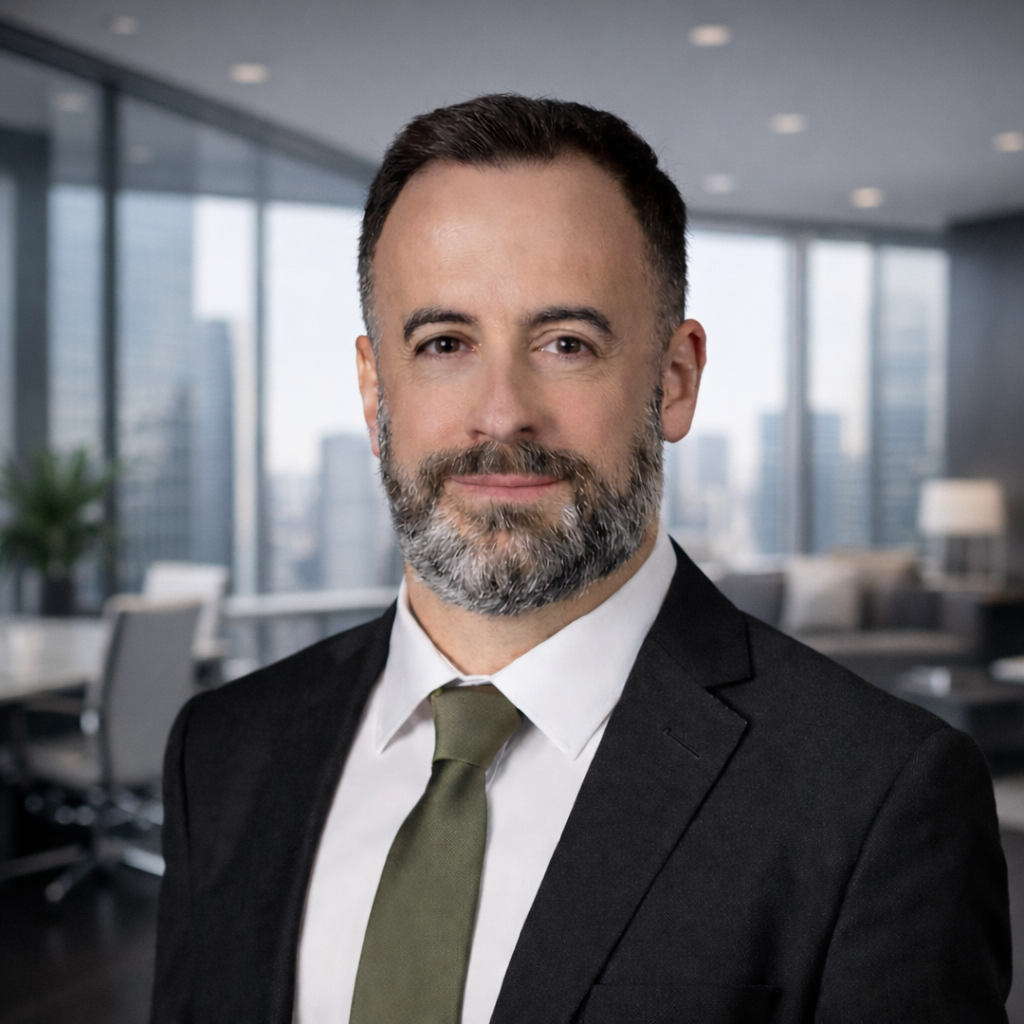 Portrait of Jacob Beaulieu in a dark suit.